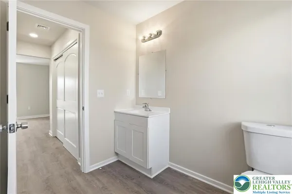 a bathroom with a sink and a toilet