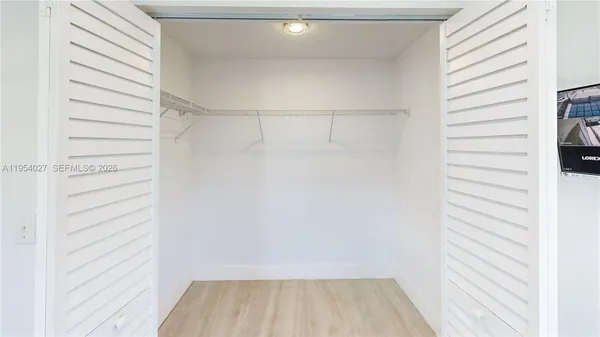 a view of a room with racks on the wall