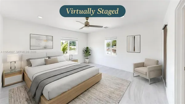 a bedroom with a bed and a couch