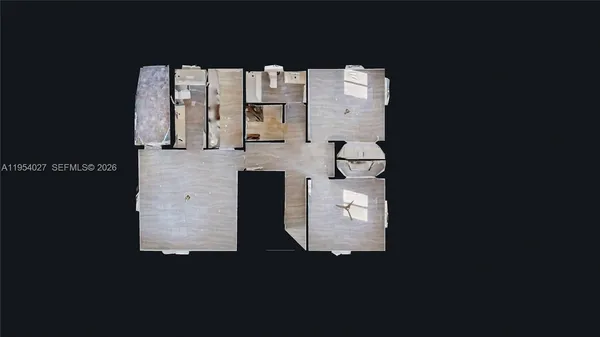 a bathroom with a granite countertop shower and a sink