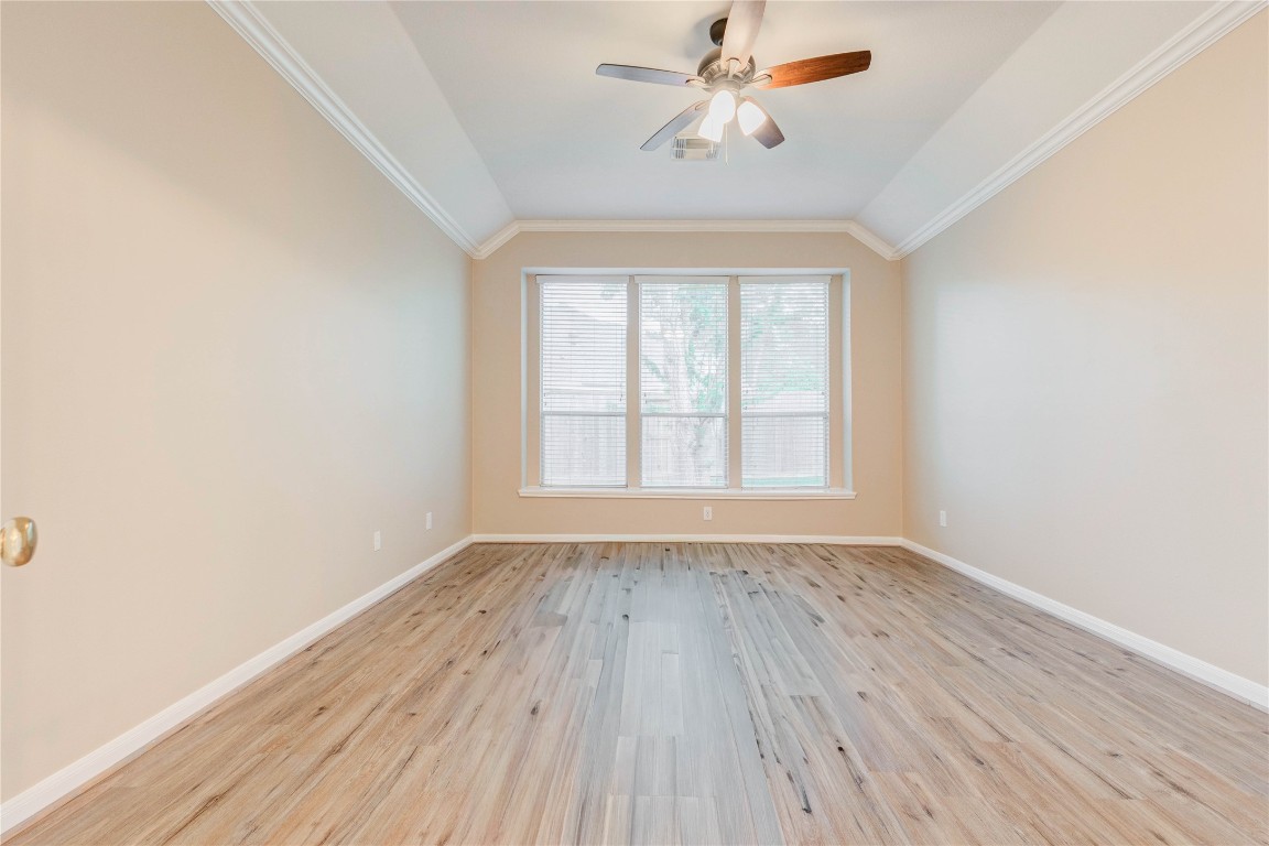 19607 Water Point Trail Humble, TX 77346 - Photo 18 of 32 Bright and airy primary bedroom with beautiful backyard views.