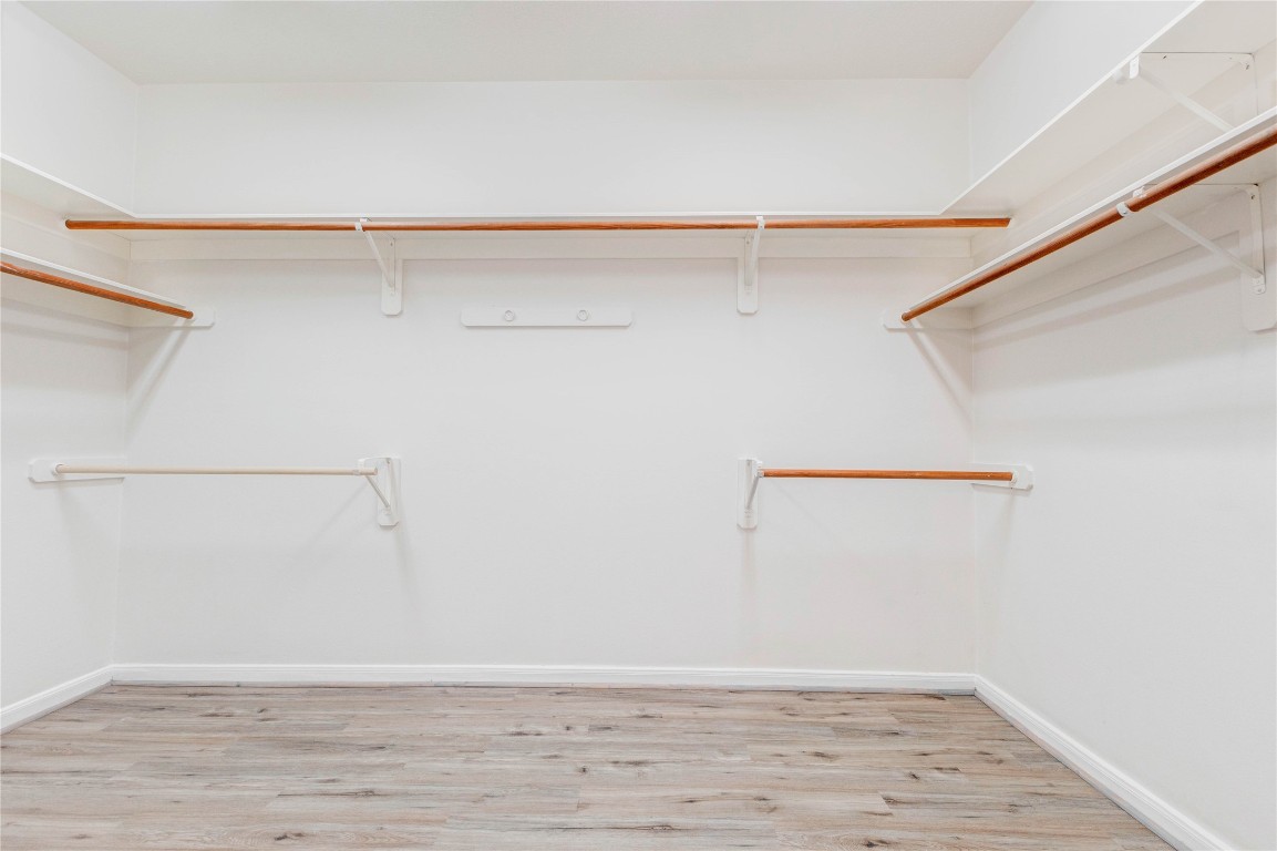 19607 Water Point Trail Humble, TX 77346 - Photo 23 of 32 Oversized walk-in closet with plenty of hanging space and storage.