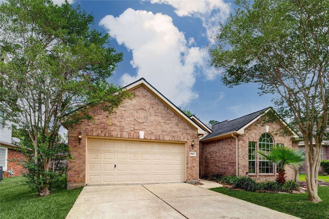 19607 Water Point Trail Humble, TX 77346 - Photo 3 of 32 Wide driveway leading to a 2-car garage with great curb appeal.