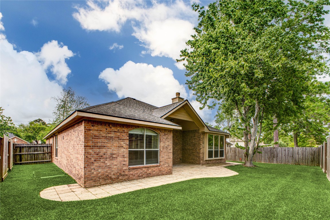 19607 Water Point Trail Humble, TX 77346 - Photo 32 of 32 Private backyard with lush green space and fully fenced yard.