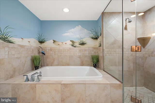 a room with furniture and white walls