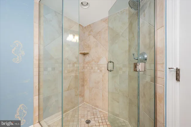 a balcony with chairs and outdoor view