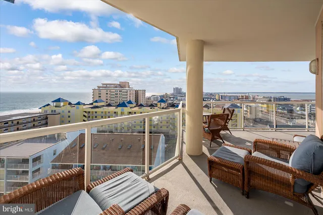 a view of a living room and a floor to ceiling window