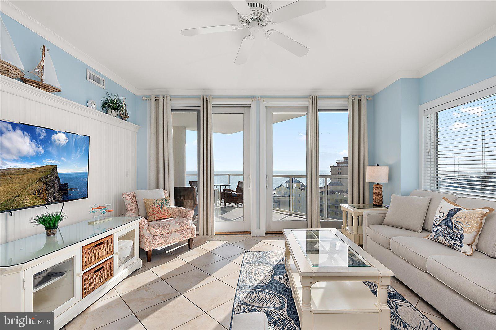 8 60th Street, Unit 902 Ocean City, MD 21842 - Photo 5 of 67 a living room with furniture and a large window