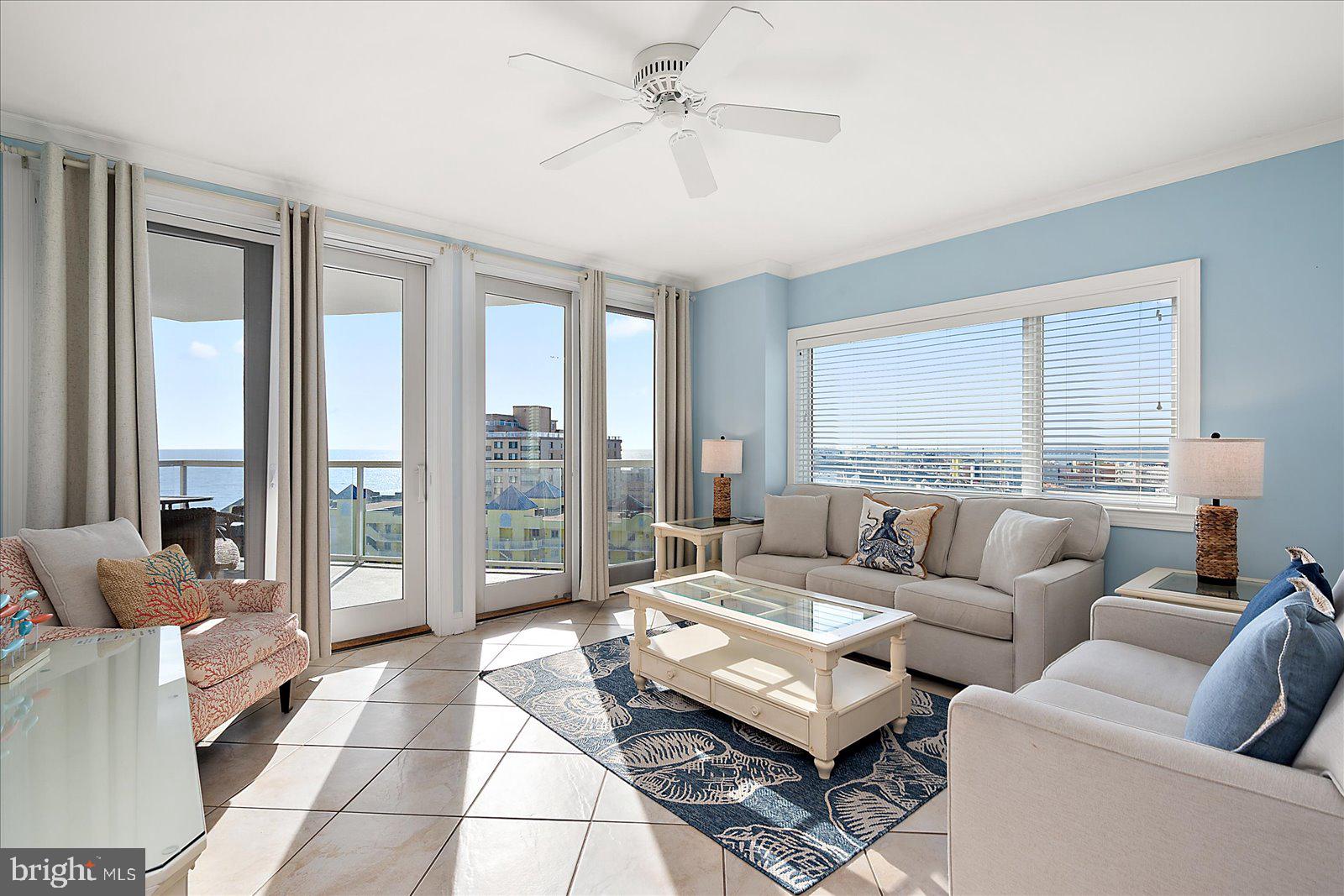 8 60th Street, Unit 902 Ocean City, MD 21842 - Photo 6 of 67 a living room with furniture and a large window