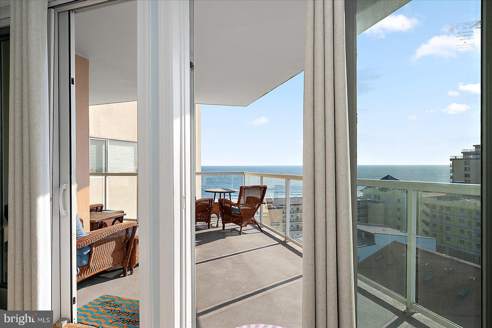 8 60th Street, Unit 902 Ocean City, MD 21842 - Photo 67 of 67 a view of a living room and a floor to ceiling window