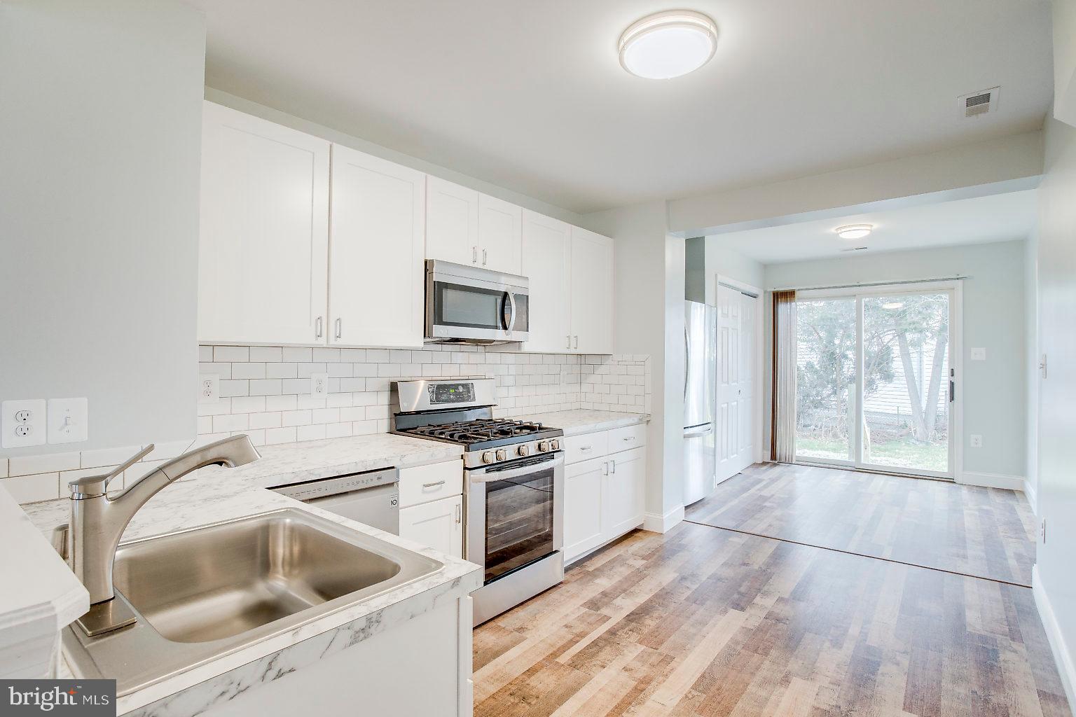 2706 West Woodwell Road Baltimore, MD 21222 - Photo 12 of 25 Kitchen-New Stainless Steel Appliances