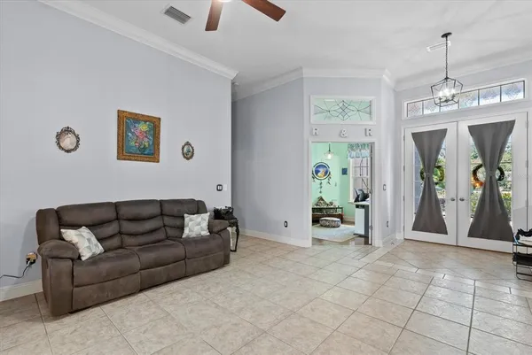 a room with furniture and a window