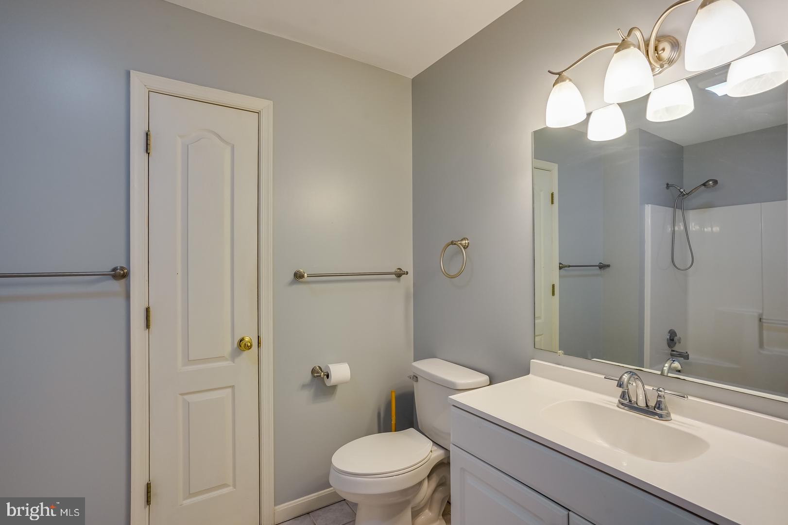 154 Winding Ridge Road Dover, DE 19904 - Photo 21 of 28 Hall Bathroom with Tub Shower
