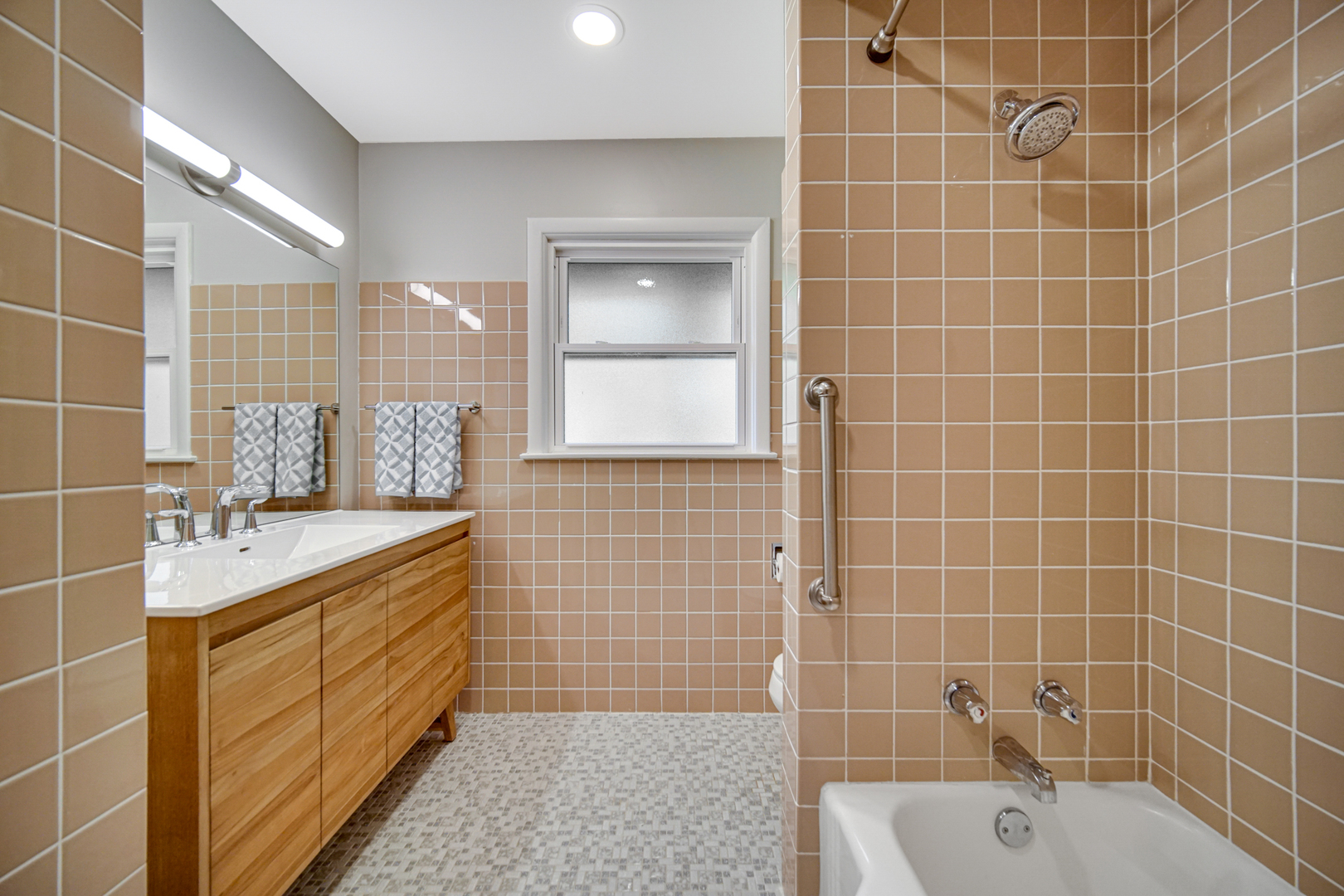 1006 Gardner Road Flossmoor, IL 60422 - Photo 16 of 33 a bathroom with a double vanity sink a toilet and mirror
