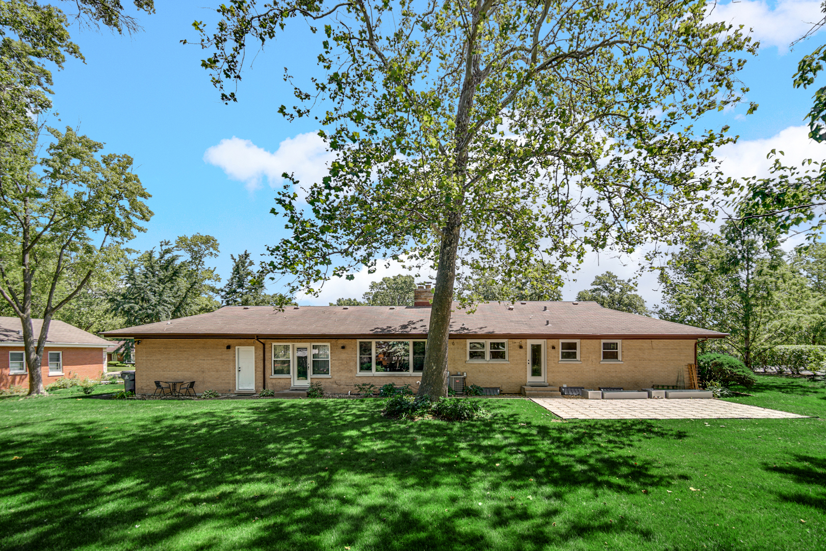 1006 Gardner Road Flossmoor, IL 60422 - Photo 28 of 33 a view of a house with a yard and sitting area