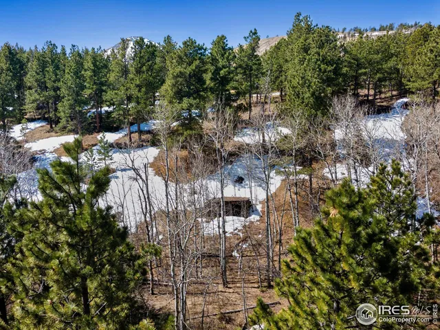 a view of a city with mountains in the background
