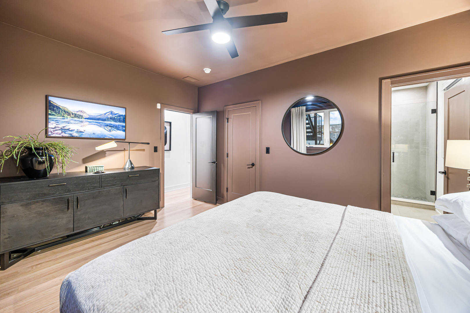 1738 West 17th Street, Unit 3 Chicago, IL 60608 - Photo 16 of 28 a bedroom with a bed and a chandelier