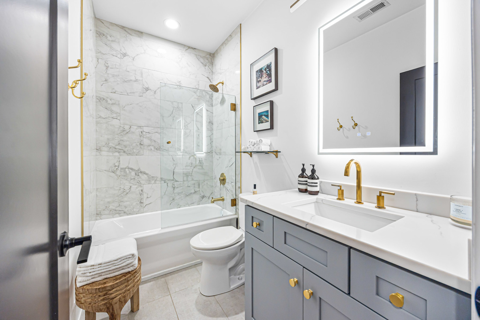 1738 West 17th Street, Unit 3 Chicago, IL 60608 - Photo 21 of 28 a bathroom with a sink a toilet and shower