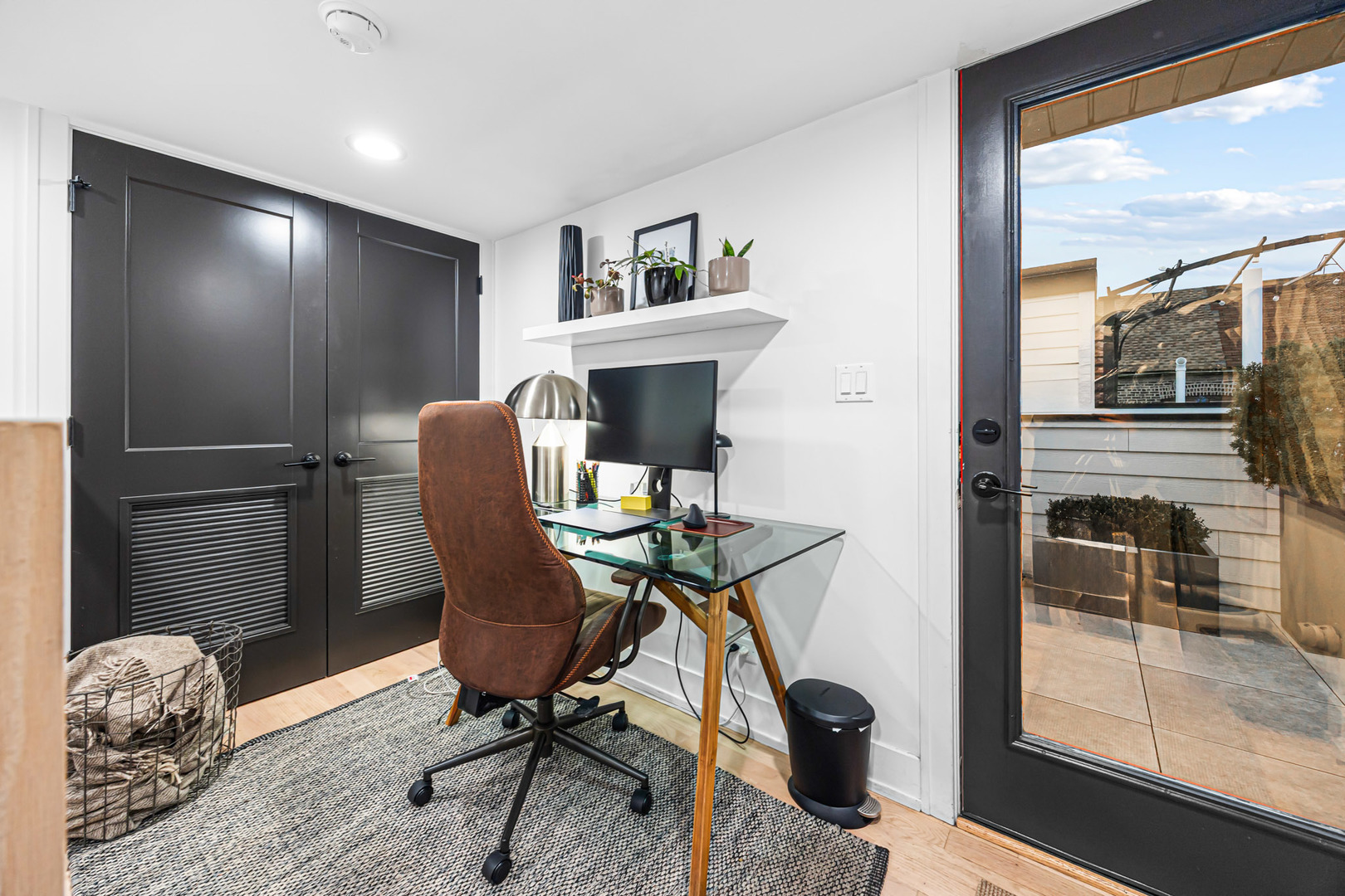 1738 West 17th Street, Unit 3 Chicago, IL 60608 - Photo 25 of 28 a view of a workspace with furniture and a window