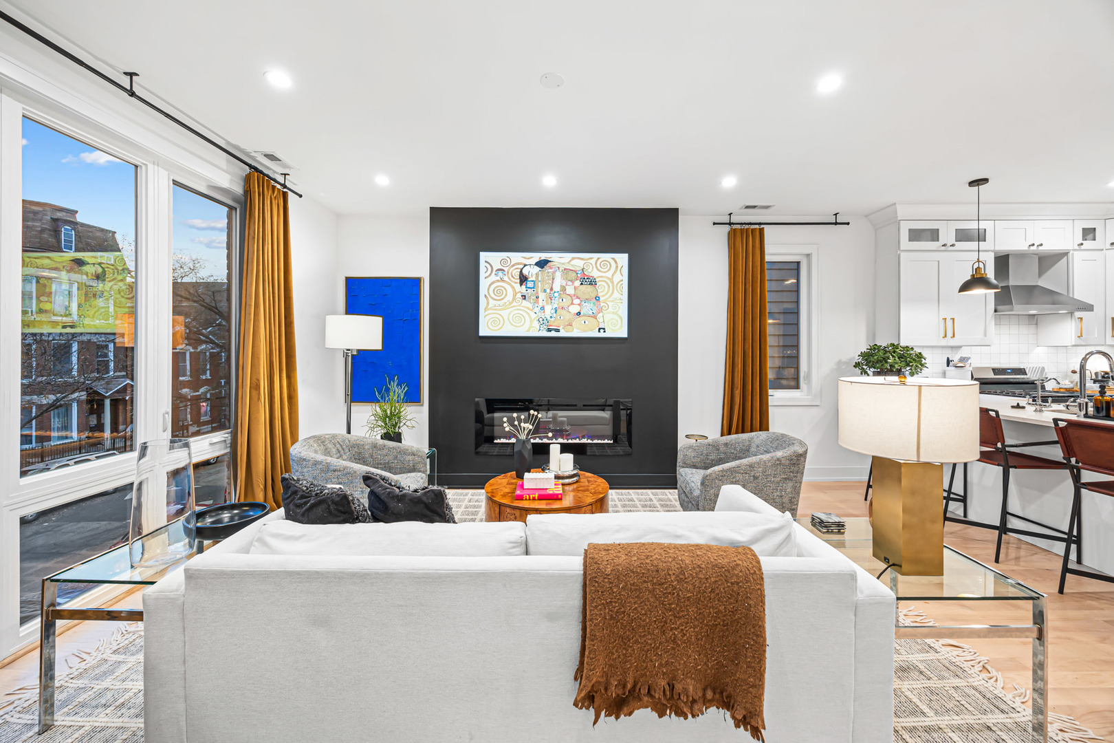 1738 West 17th Street, Unit 3 Chicago, IL 60608 - Photo 10 of 28 a living room with fireplace furniture and a large window
