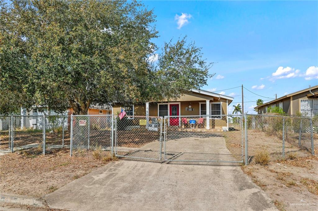809 Nogales Street Alton, TX 78573 - Photo 1 of 1 a view of a house with a yard and sitting area