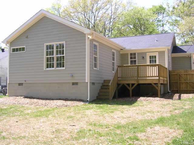 1826 Watkins Street Raleigh, NC 27604 - Photo 7 of 9 a front view of a house with a yard