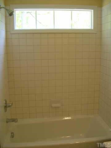 1826 Watkins Street Raleigh, NC 27604 - Photo 8 of 9 a bathroom with a bathtub