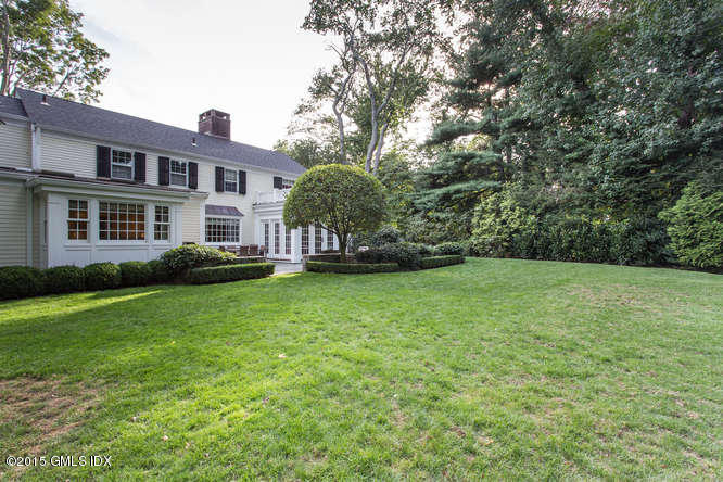 47 Winthrop Drive Riverside, CT 06878 - Photo 29 of 32 a backyard of a house with lots of green space