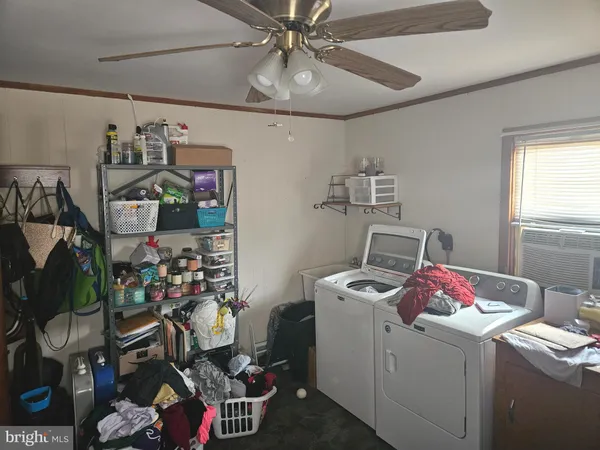 a room with gym equipment and a window