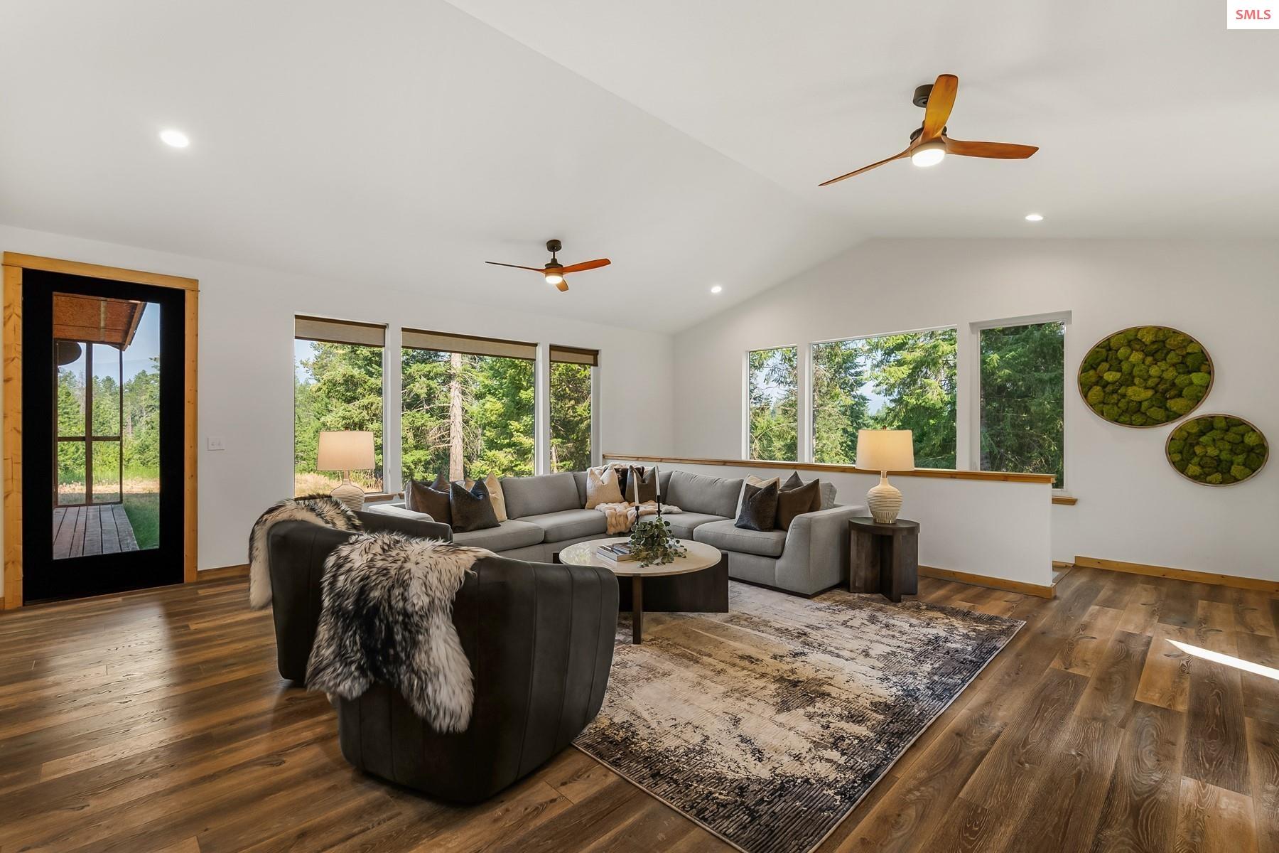 672 Hopkins Road Sandpoint, ID 83864 - Photo 12 of 61 Flow seamlessly from the Living Area to the Kitchen and Dining space