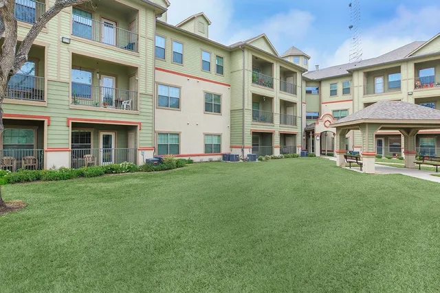 front view of a building with a yard