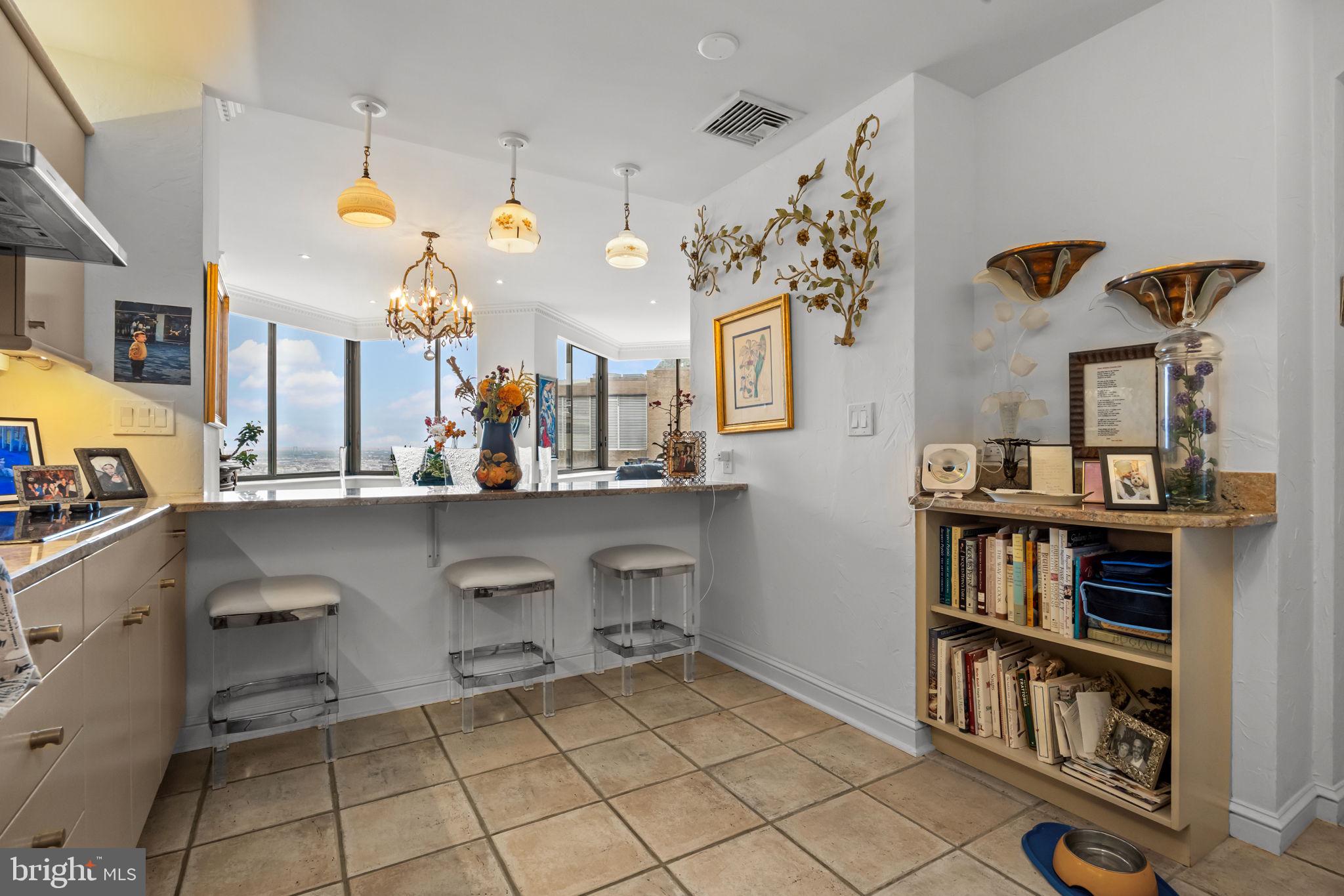 202 West Rittenhouse Square, Unit 2608 Philadelphia, PA 19103 - Photo 13 of 35 a view of a kitchen and workspace