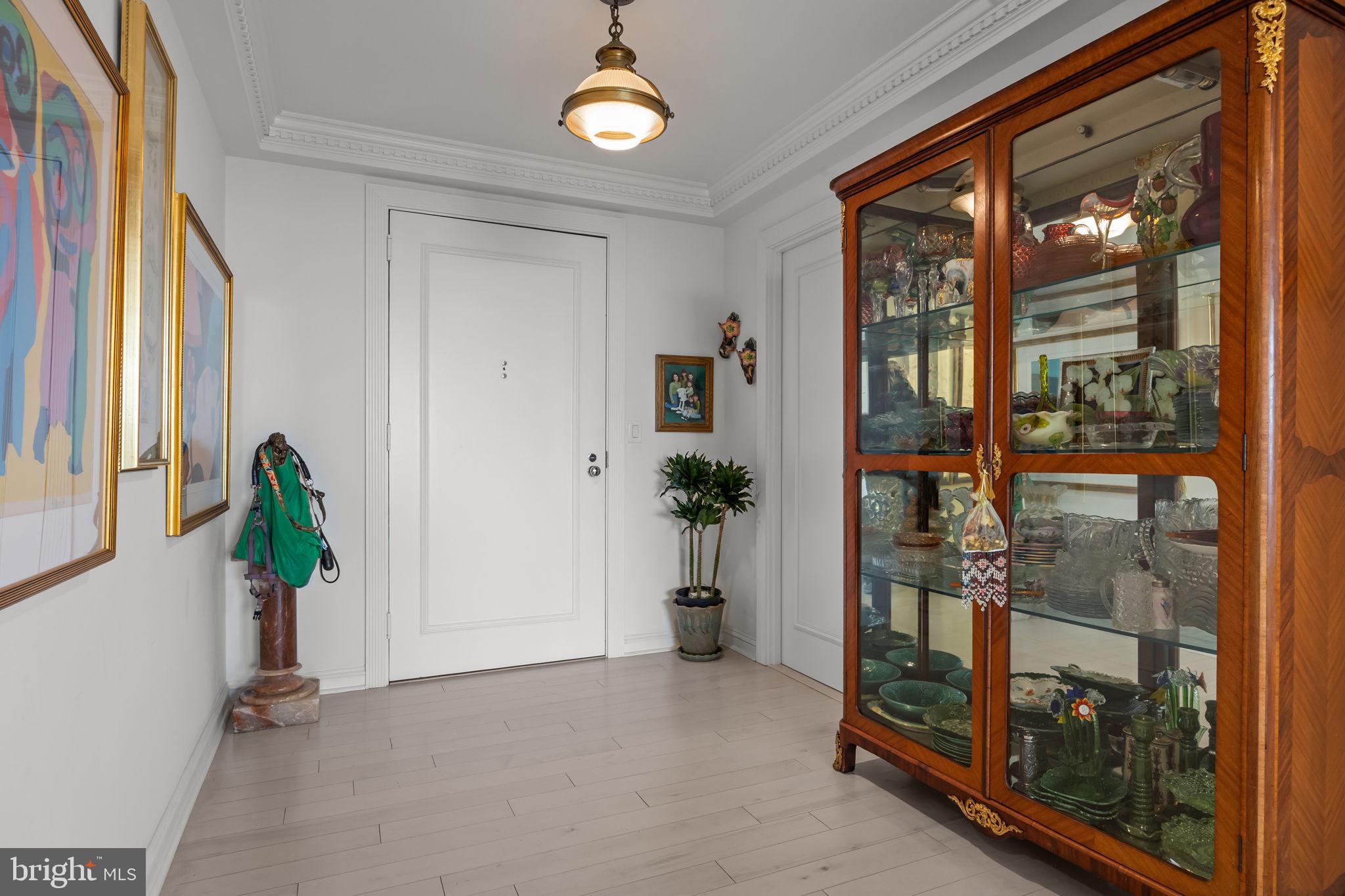 202 West Rittenhouse Square, Unit 2608 Philadelphia, PA 19103 - Photo 21 of 35 a view of an entryway with wooden floor and door