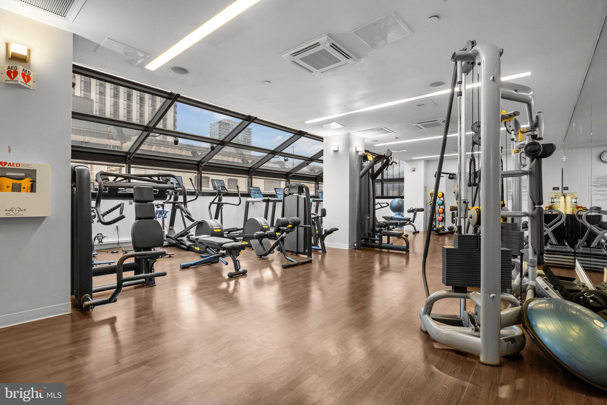 202 West Rittenhouse Square, Unit 2608 Philadelphia, PA 19103 - Photo 28 of 35 a gym room with lots of gym equipment