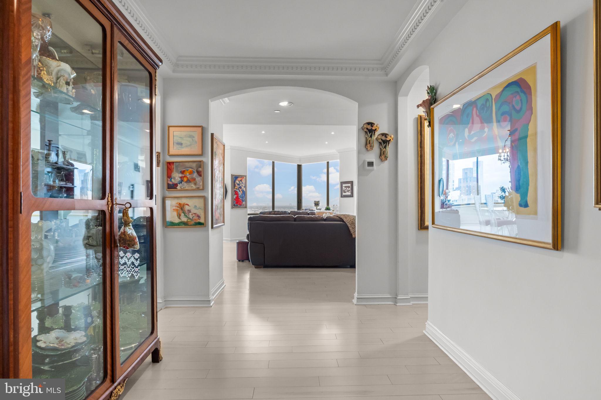 202 West Rittenhouse Square, Unit 2608 Philadelphia, PA 19103 - Photo 3 of 35 a living room with furniture and a view of bathroom