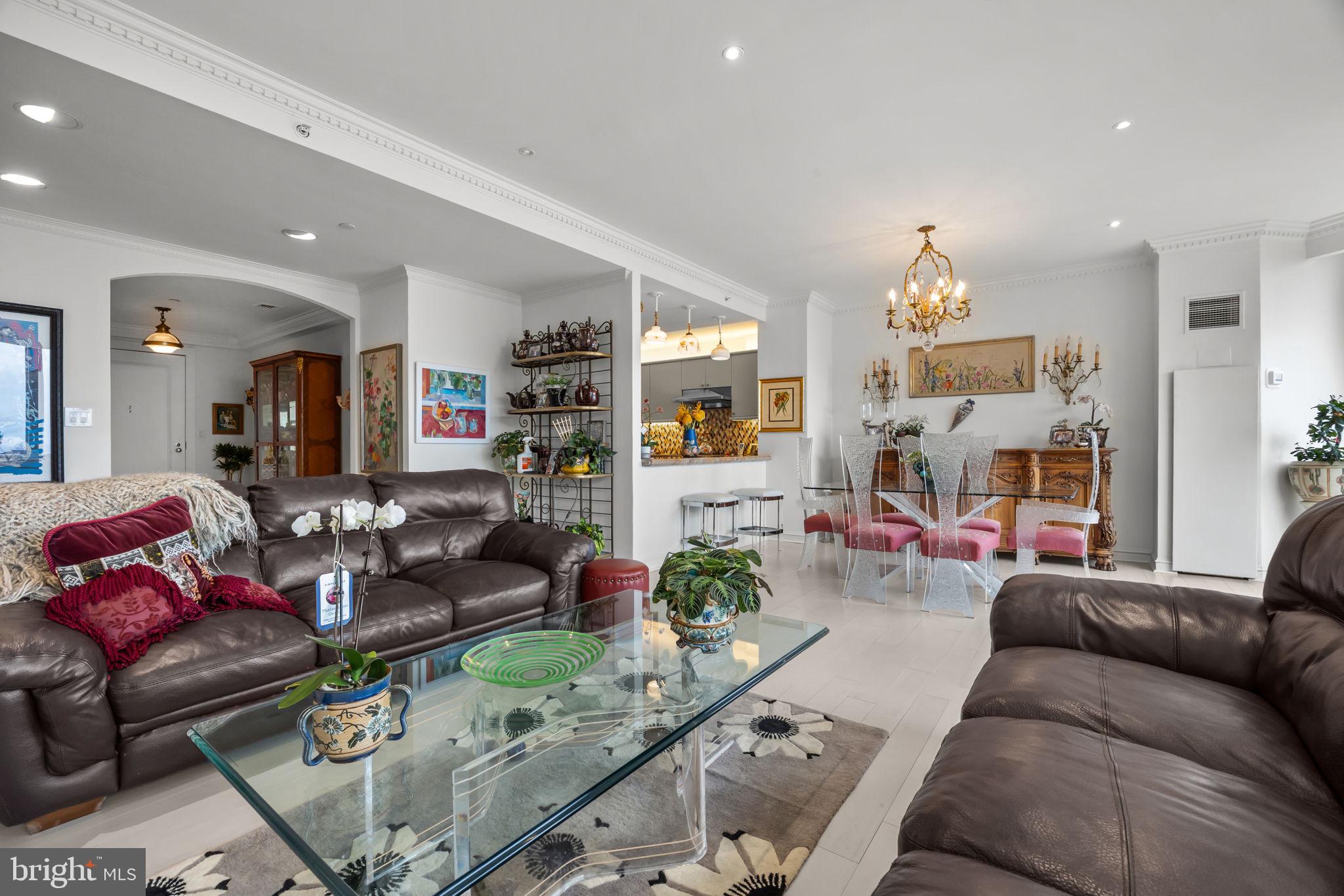 202 West Rittenhouse Square, Unit 2608 Philadelphia, PA 19103 - Photo 7 of 35 a living room with furniture and wooden floor