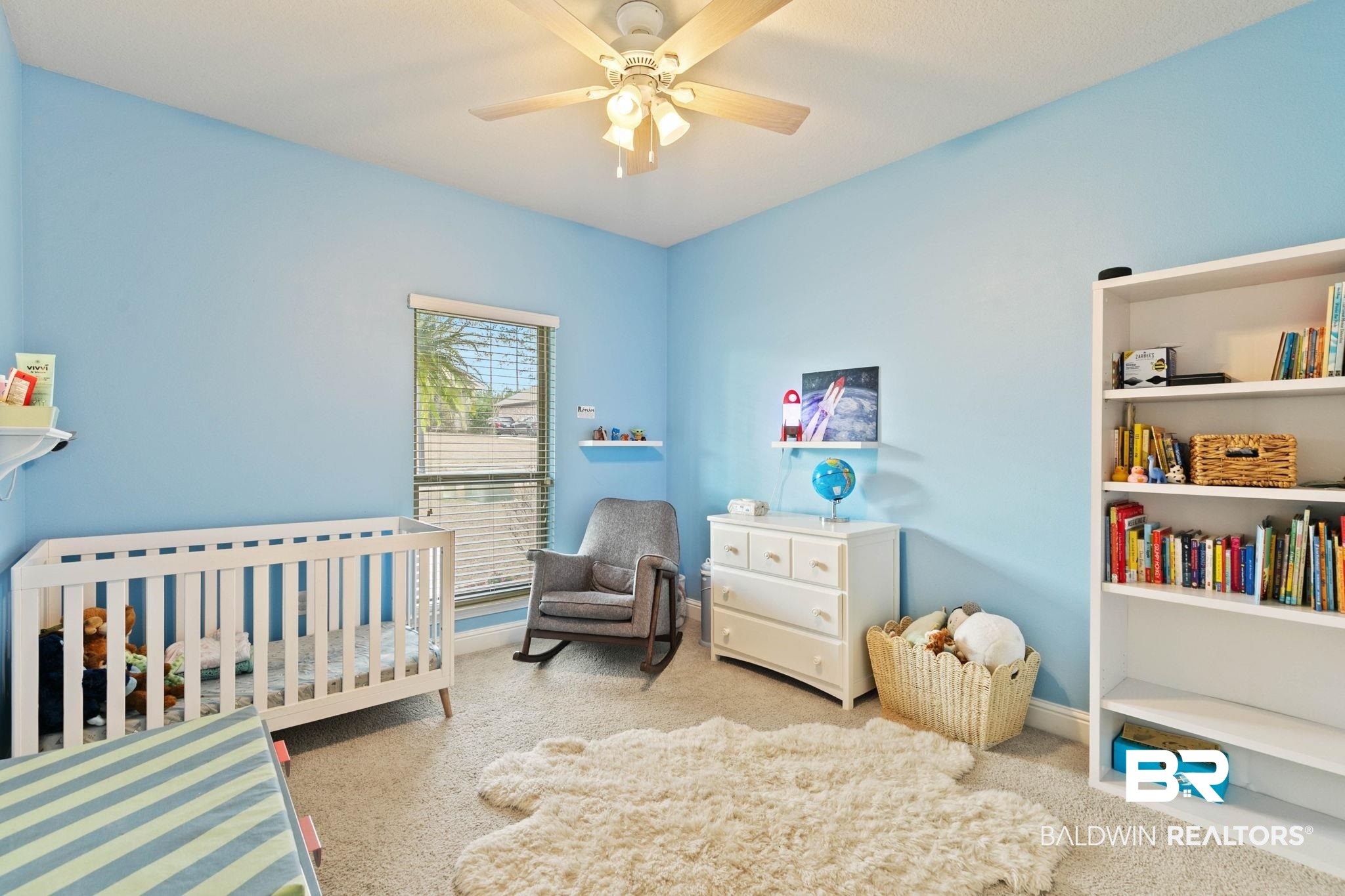 31350 Hoot Owl Road Daphne, AL 36527 - Photo 37 of 94 Carpeted bedroom featuring a crib and a ceiling fan