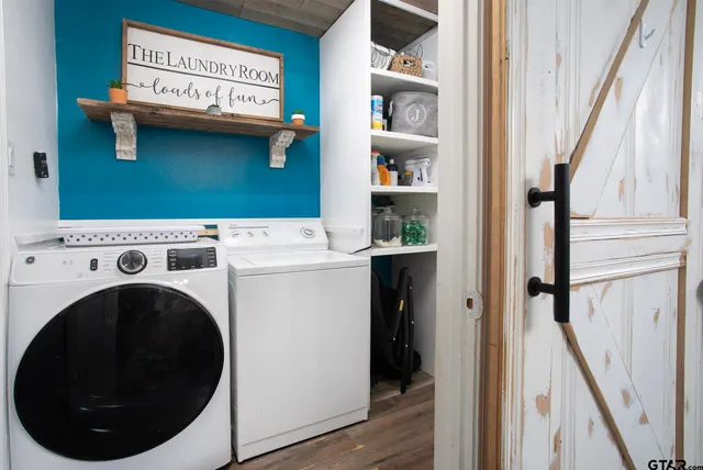 a utility room with dryer and washer