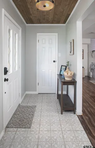a view of a livingroom with furniture and wooden floor