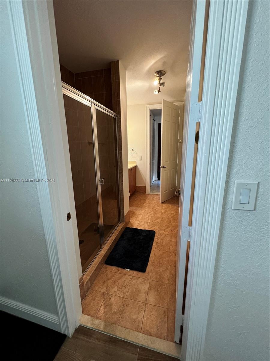 7985 Southwest 195th Street Cutler Bay, FL 33157 - Photo 14 of 16 a view of walk in closet