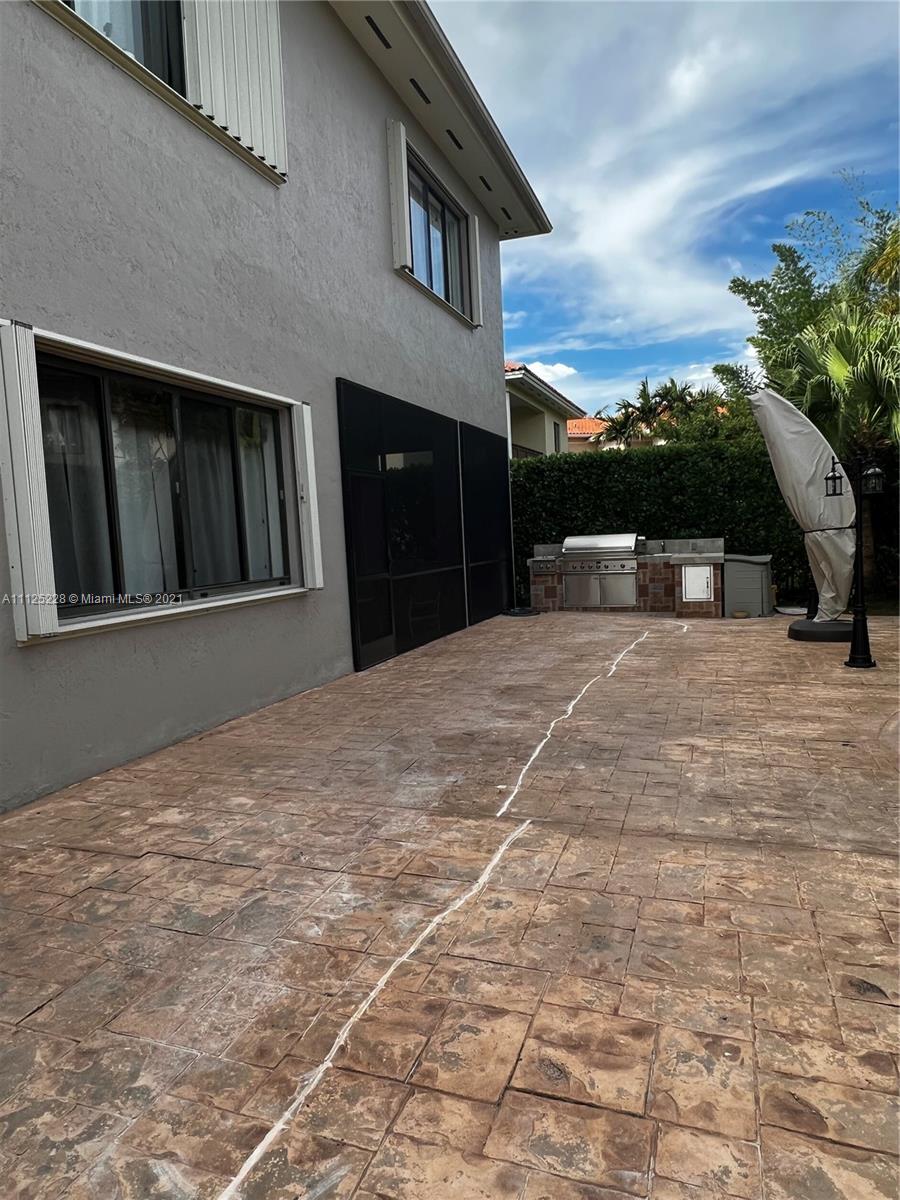 7985 Southwest 195th Street Cutler Bay, FL 33157 - Photo 16 of 16 a view of a building with a outdoor space