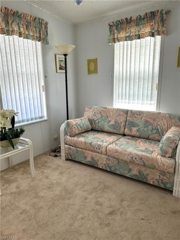 4680 Slash Pine Way West Estero, FL 33928 - Photo 19 of 20 a living room with furniture and a window