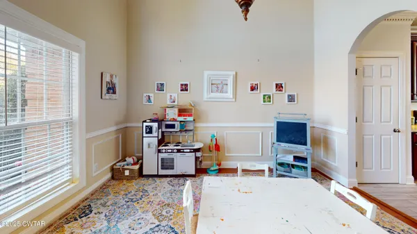 a workspace with furniture and window