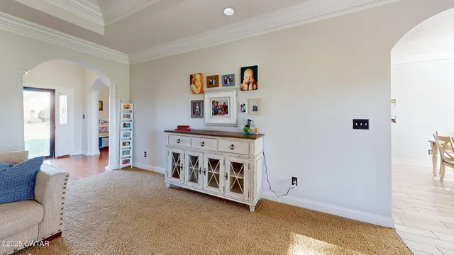 a view of livingroom with furniture and windows