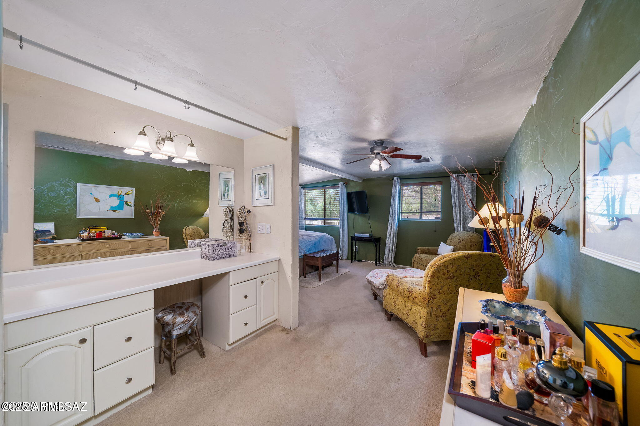 2350 West Sunkist Road Tucson, AZ 85755 - Photo 18 of 39 a living room with furniture and a flat screen tv