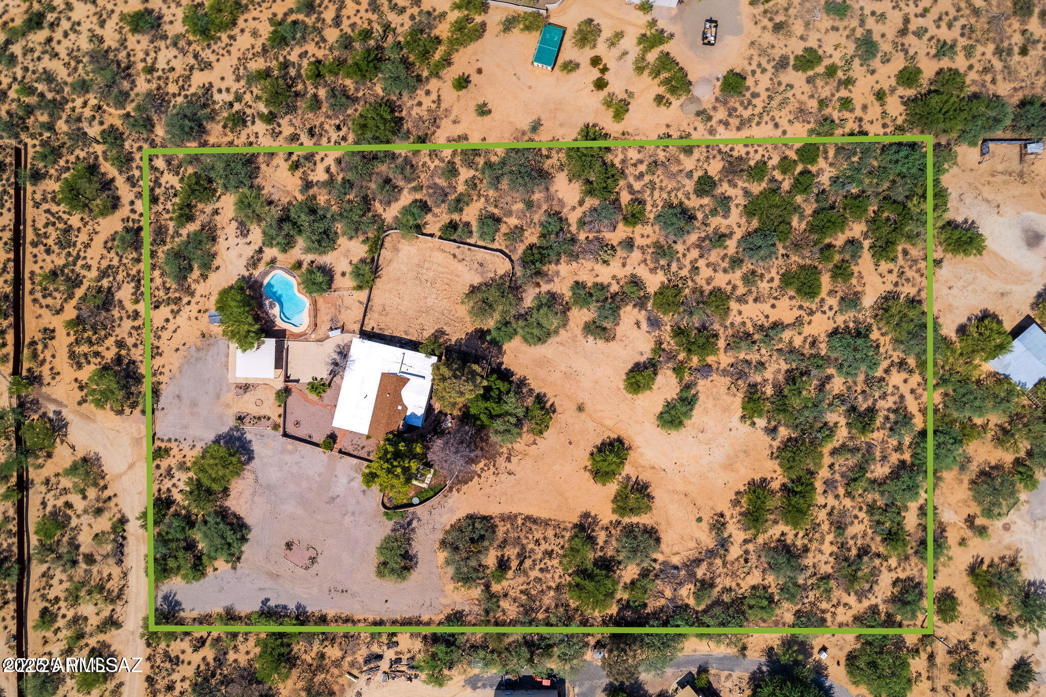 2350 West Sunkist Road Tucson, AZ 85755 - Photo 3 of 39 an aerial view of a residential houses with outdoor space and parking
