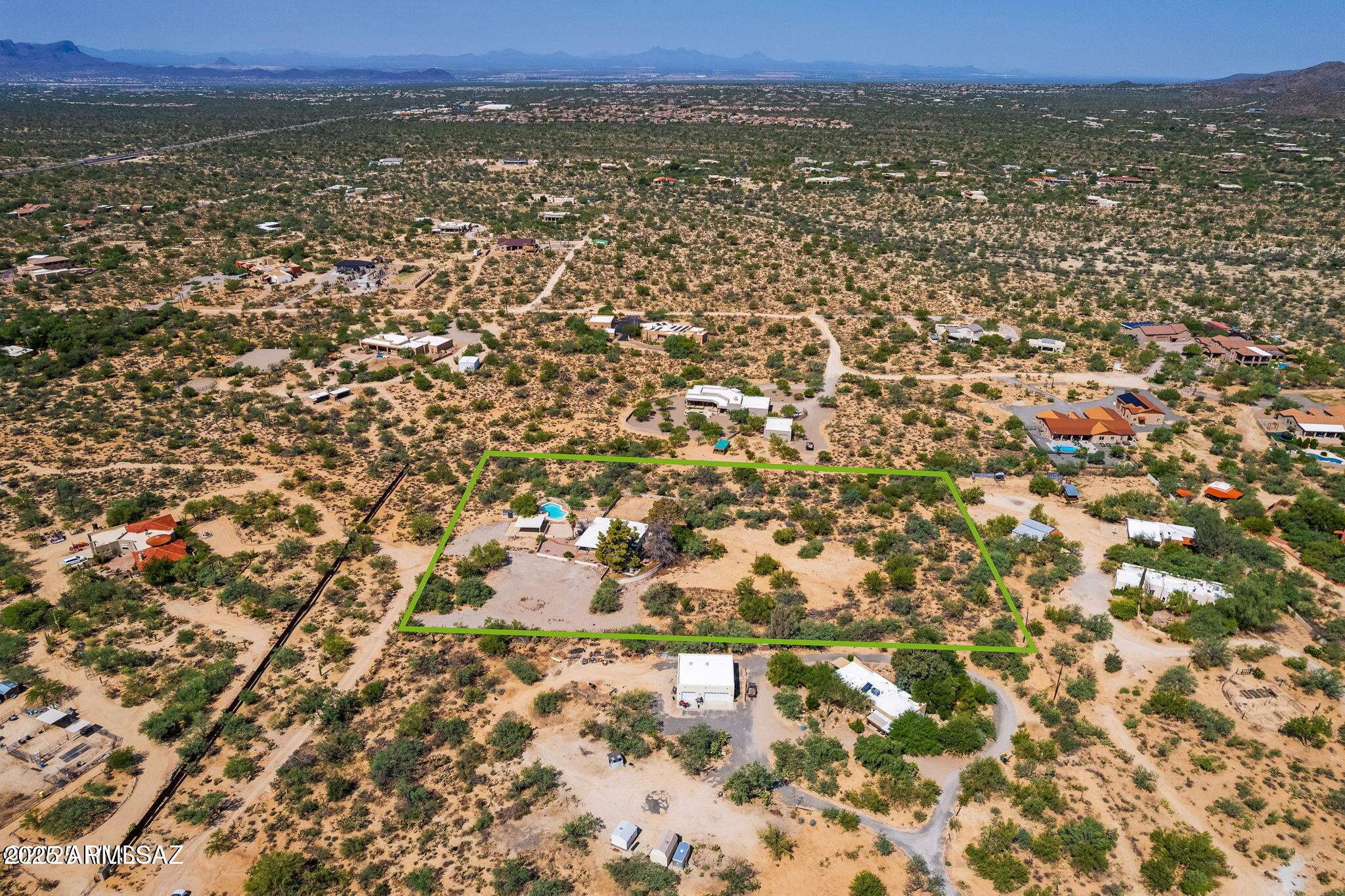 2350 West Sunkist Road Tucson, AZ 85755 - Photo 37 of 39 an aerial view of residential houses with outdoor space and trees