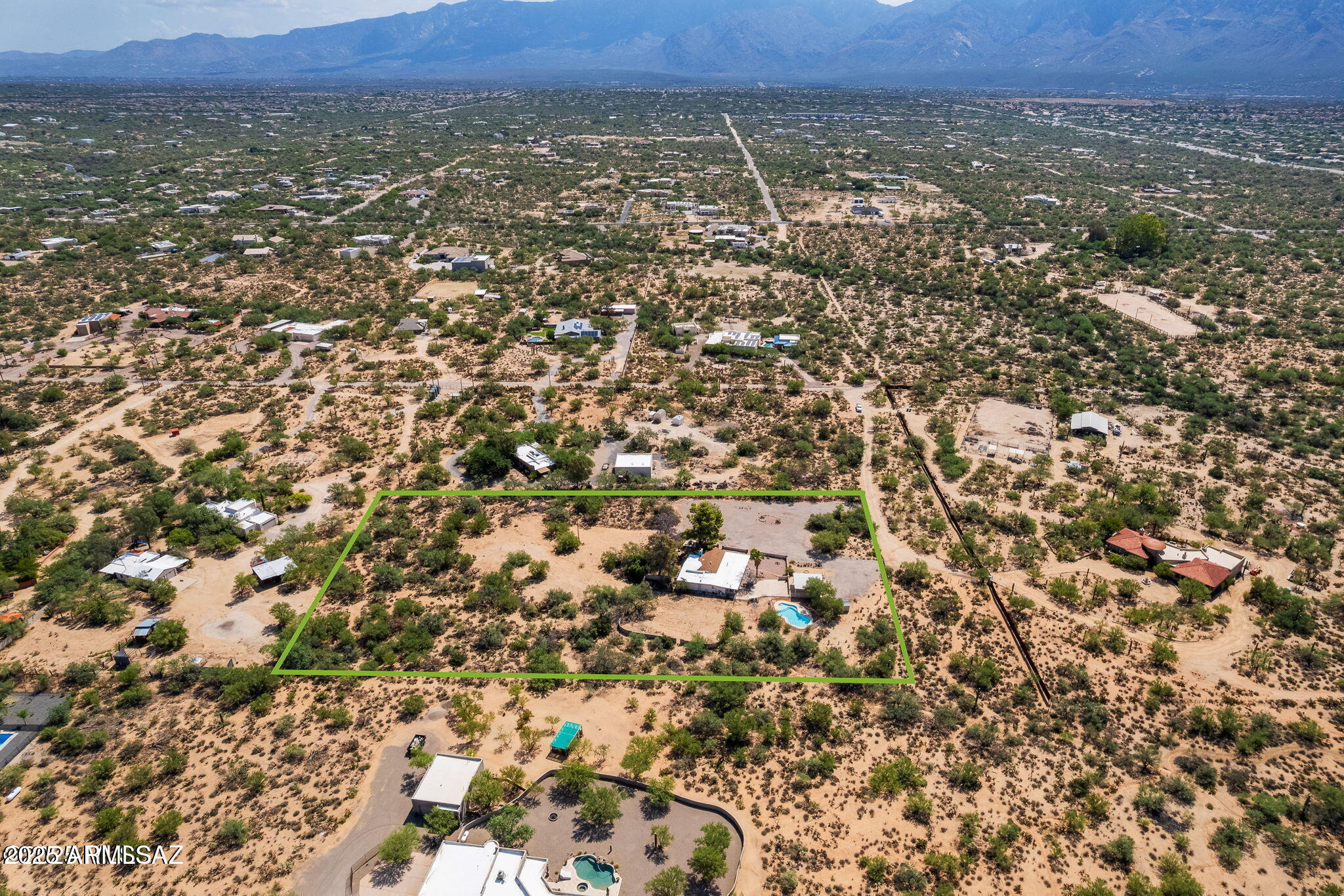 2350 West Sunkist Road Tucson, AZ 85755 - Photo 5 of 39 an aerial view of a house with a yard