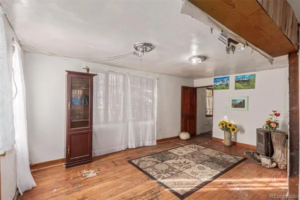 a view of a hallway view with staircase