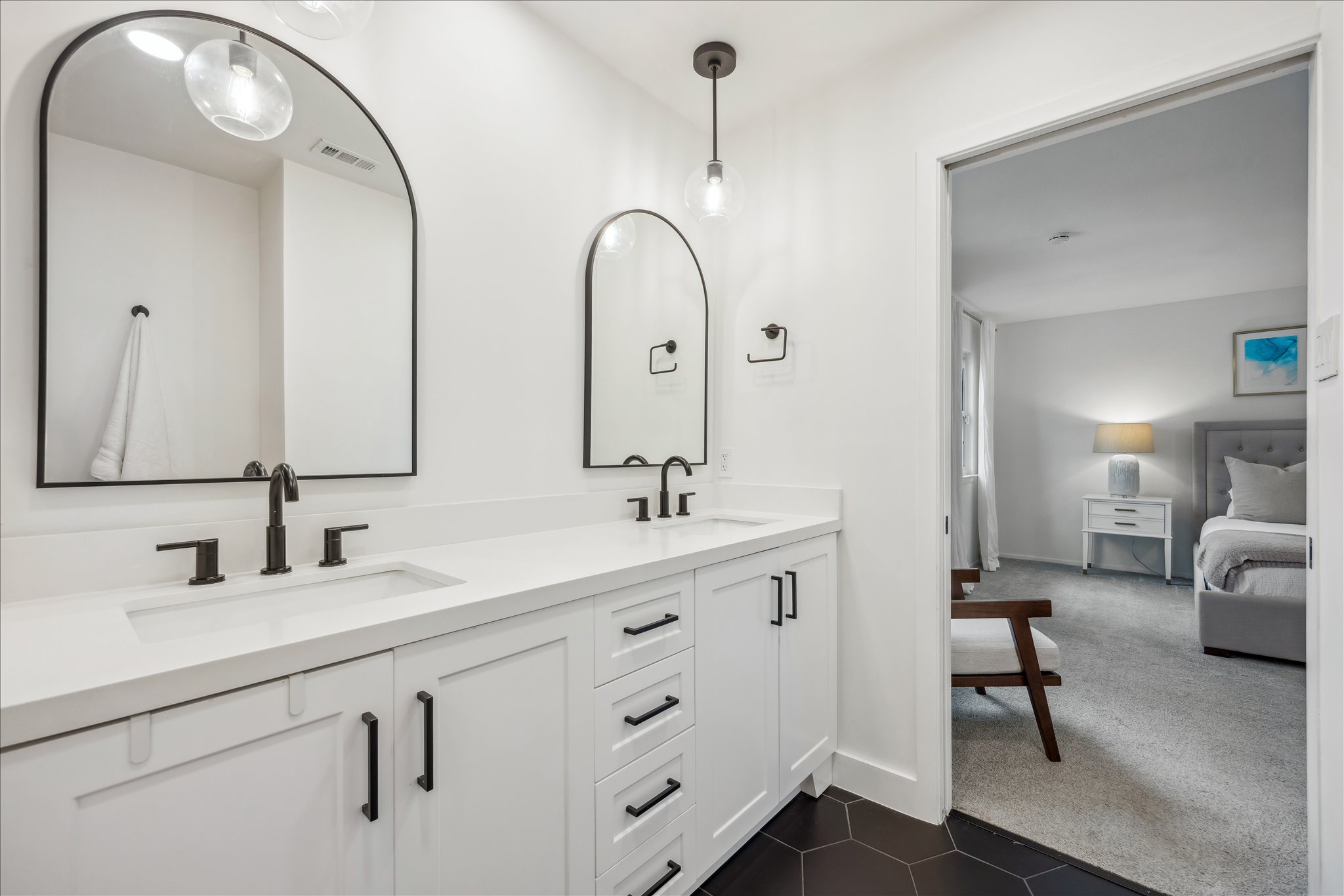12935 Pegasus Street Austin, TX 78727 - Photo 26 of 38 A pocket door provides privacy from the primary bedroom